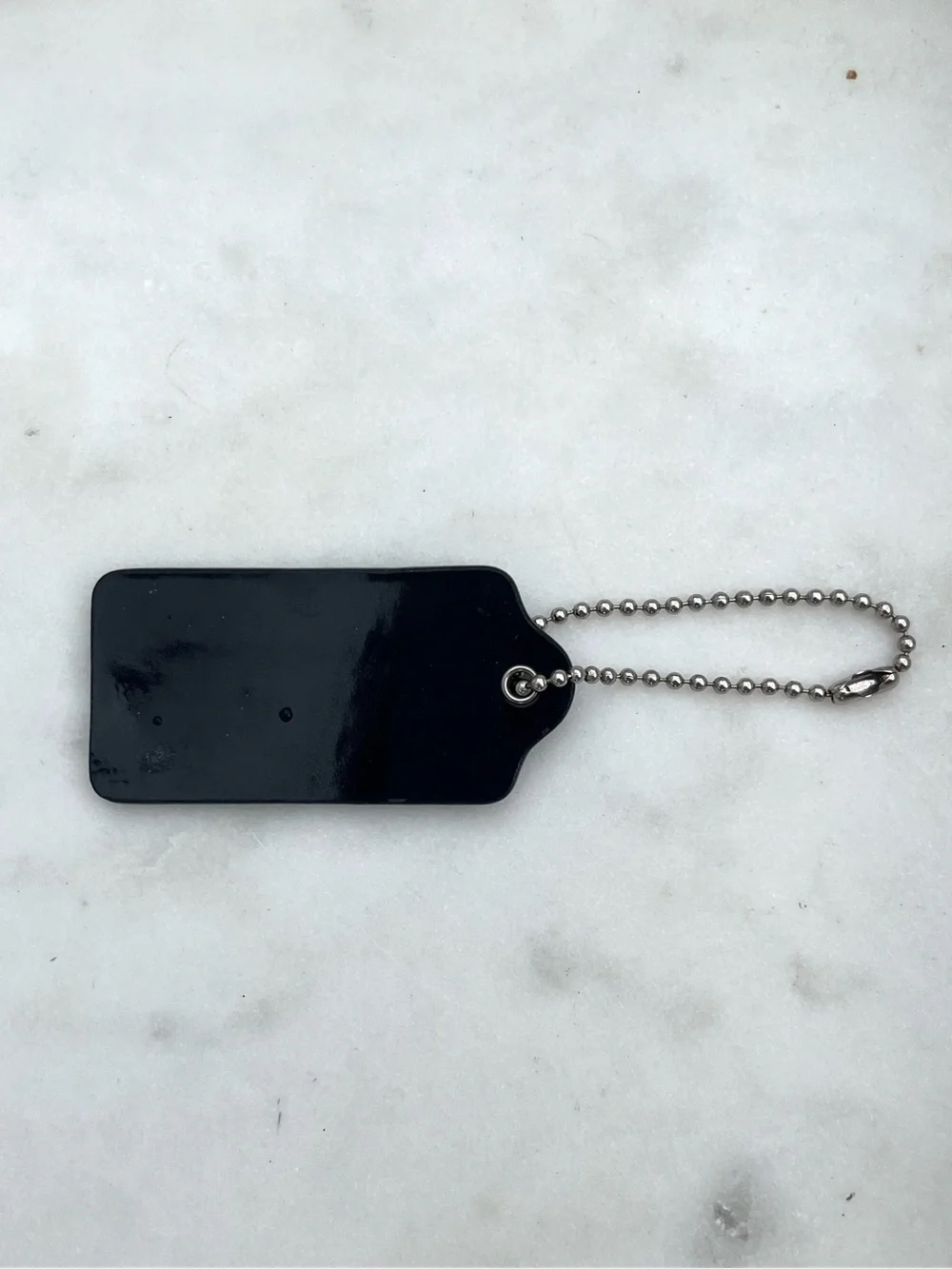 COACH Sleek Patent Leather Hang Tag, Black